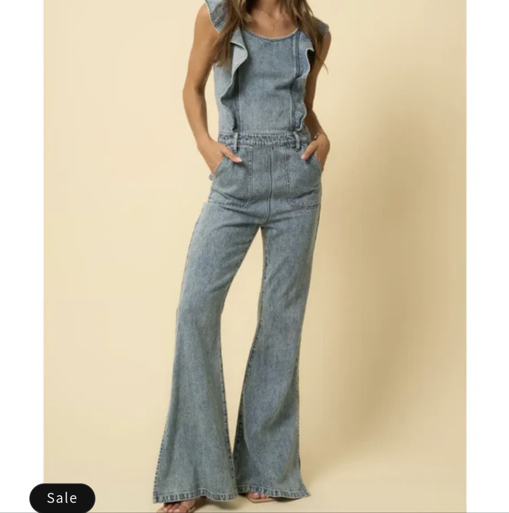 NWT backless ruffle jumpsuit by insane gene